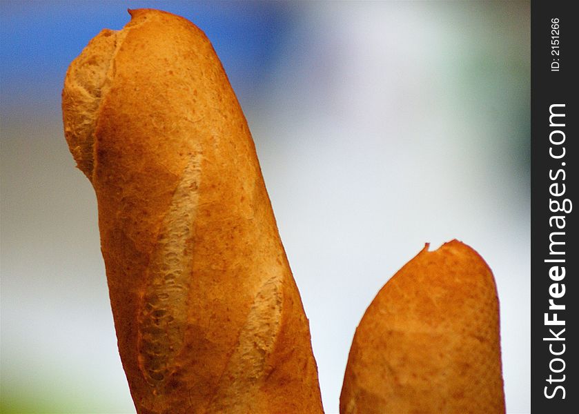 Newly baked French baguettes at a bakery