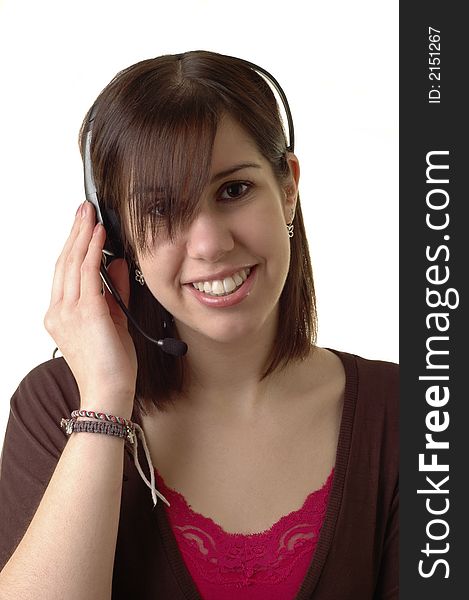 Young woman talking on a headset telephone. Young woman talking on a headset telephone.