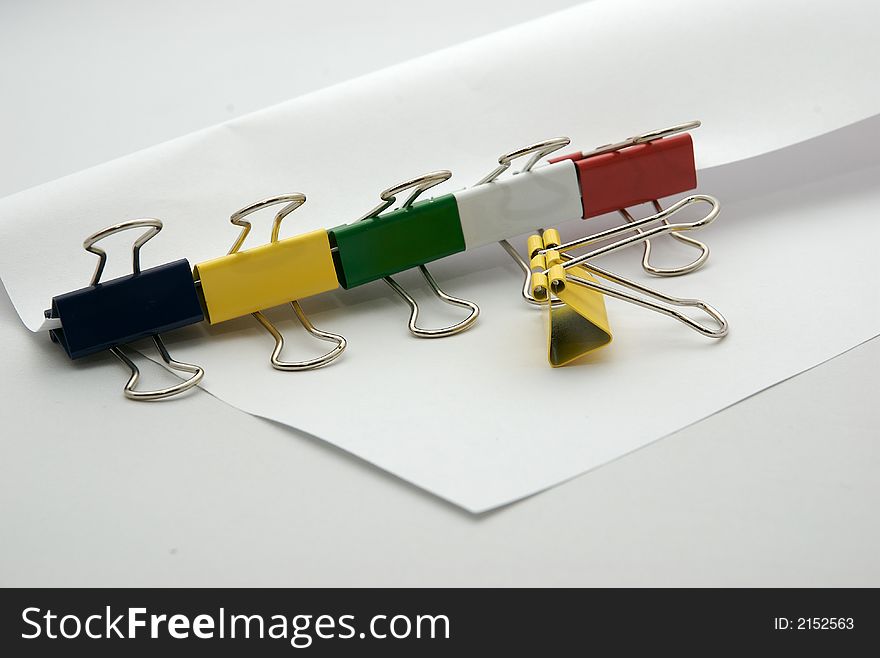 Close-up of binder clip with a several colors. Close-up of binder clip with a several colors