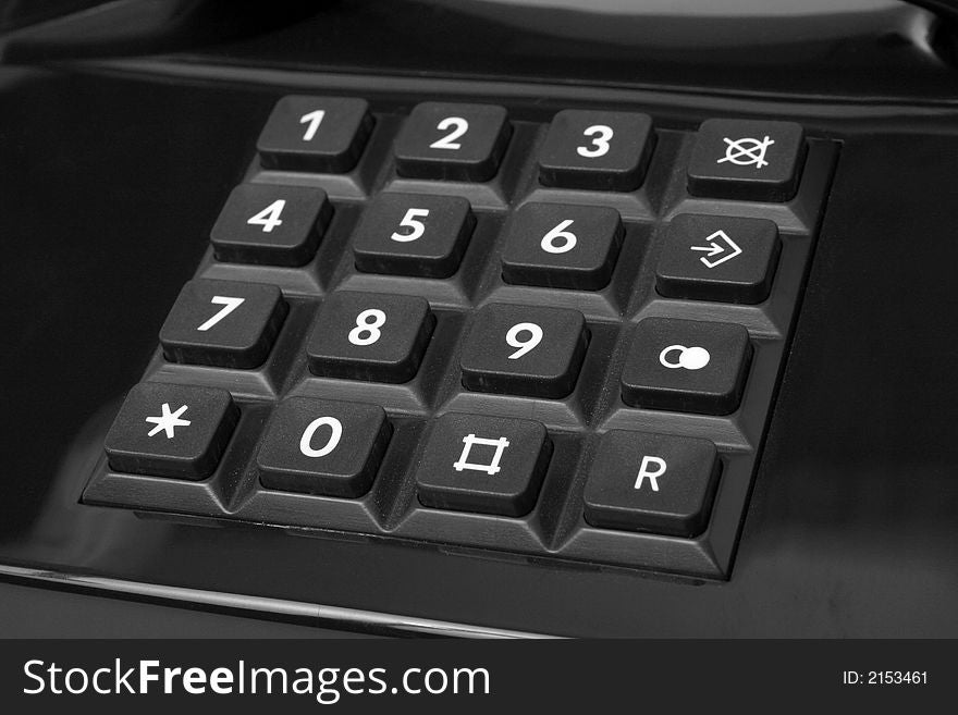 Push-button dial of phone of black color, isolated