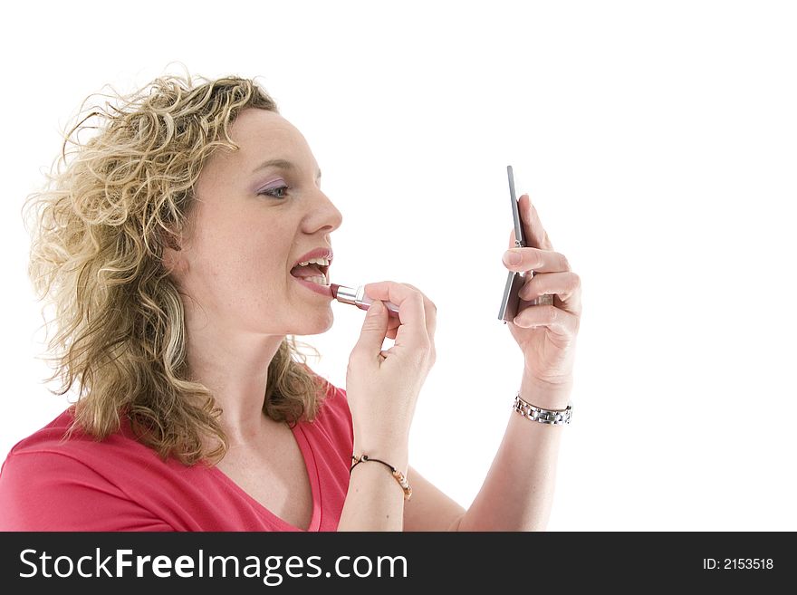 Attractive blonde with a lipstick isolated on white. Attractive blonde with a lipstick isolated on white