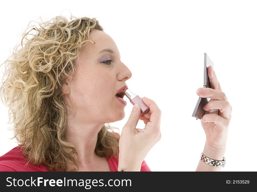 Attractive blonde with a lipstick isolated on white. Attractive blonde with a lipstick isolated on white