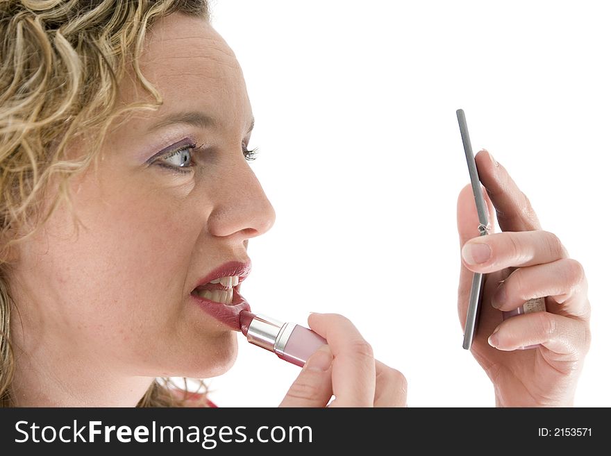 Attractive blonde with a lipstick isolated on white. Attractive blonde with a lipstick isolated on white