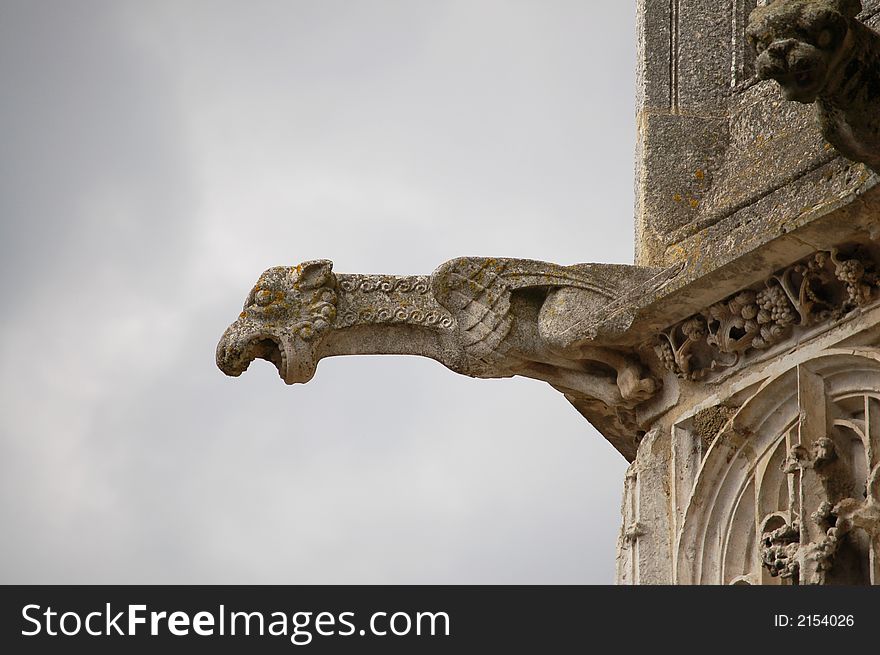 Gothic gargoyle jutting out from a church. Gothic gargoyle jutting out from a church