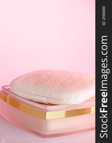 Cosmetic powder with pink cast