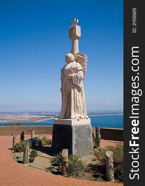 A statue of the explorer Cabrillo looks on toward San Diego. A statue of the explorer Cabrillo looks on toward San Diego