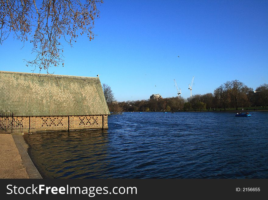The serpentine lake in Hyde park London with birds flying