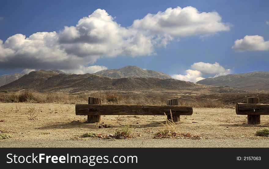 Log Bench in the Desert on a Sunny Afternoon. Log Bench in the Desert on a Sunny Afternoon