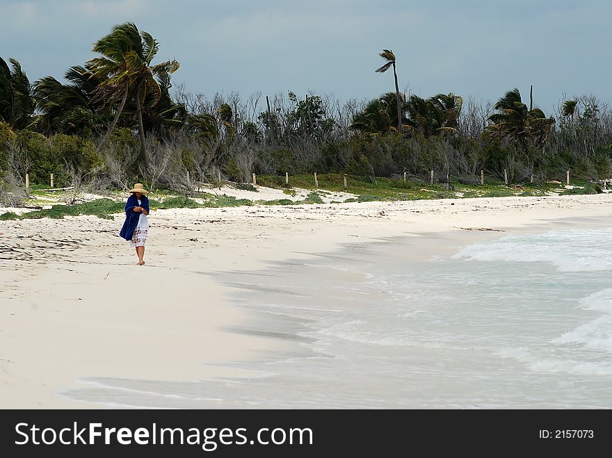 Beautiful Carribbean beach one female walking. Beautiful Carribbean beach one female walking