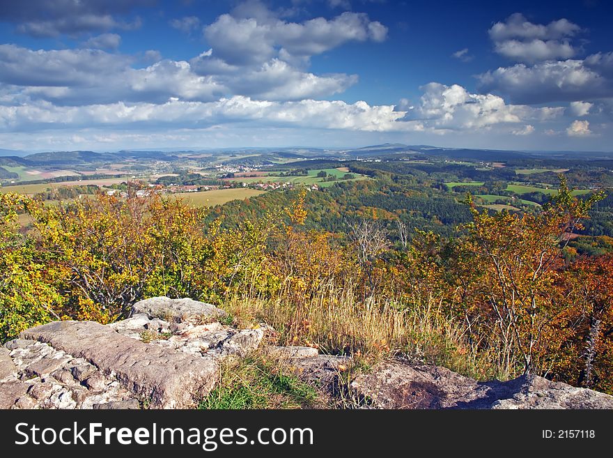 Autumn landscape with blue sky and clouds