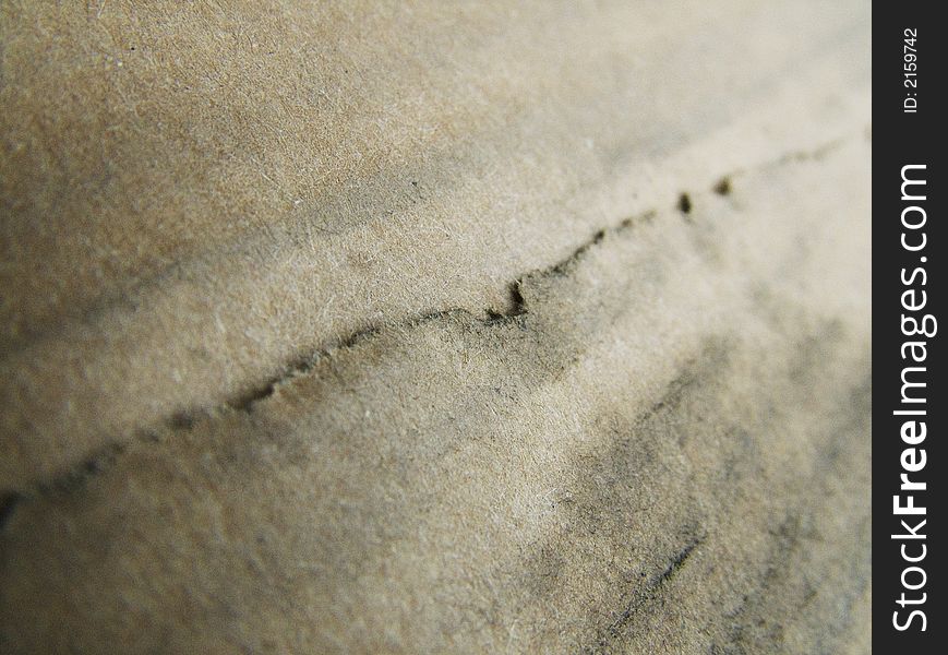 Image of ripped dirty cardboard