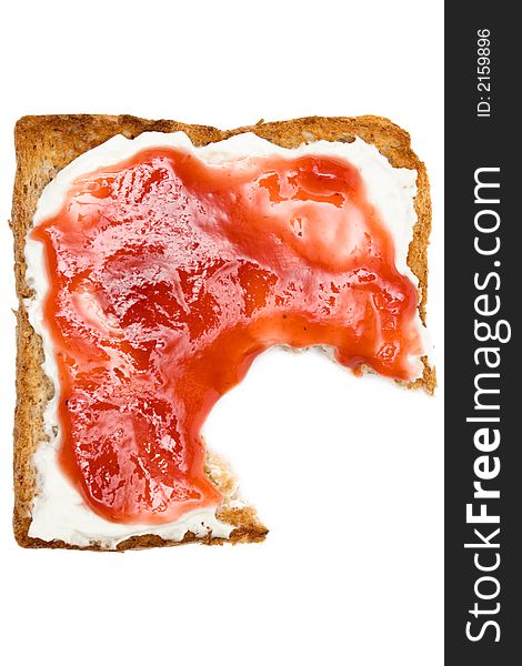 Eating a toast with raspberry jam. Isolated on a white background. Eating a toast with raspberry jam. Isolated on a white background.