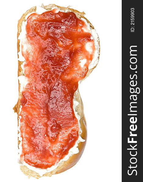 Butter and raspberry jam on a slice of bread. Isolated on a white background. Butter and raspberry jam on a slice of bread. Isolated on a white background.