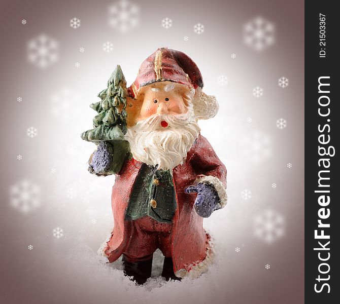 Toy Santa Claus with christmas tree and snowflakes. Toy Santa Claus with christmas tree and snowflakes