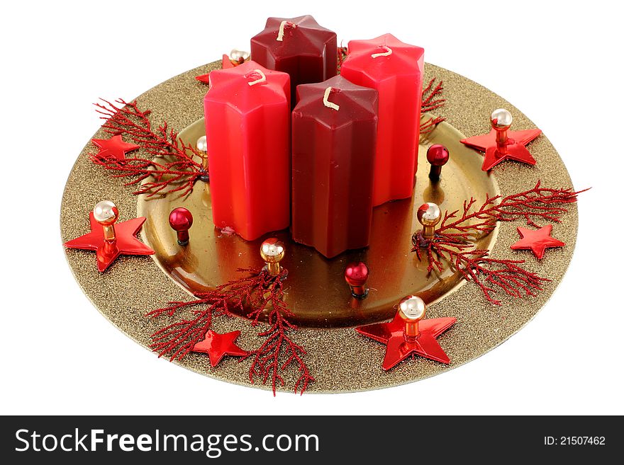 Christmas wreath isolated on white background. Focus on the foreground, intentional shallow depth of field. Studio work.