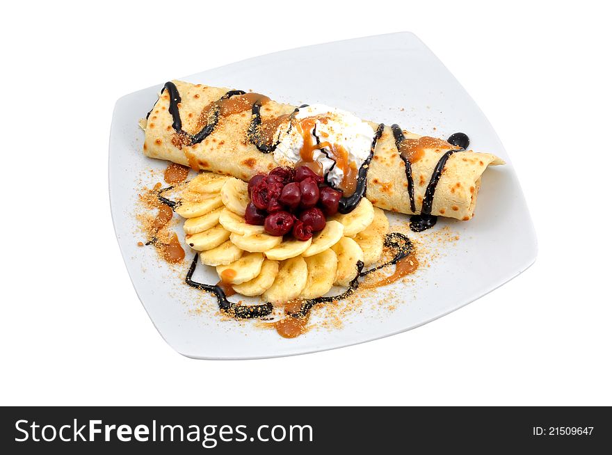 Chocolate pancake with bananas, cherries and cream. Chocolate pancake with bananas, cherries and cream