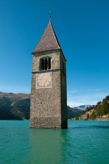 Resia Lake (Italy) - The Submerged Bell Tower Stock Photo Resia Lake (Italy) - The Submerged Bell Tower Stock Photo