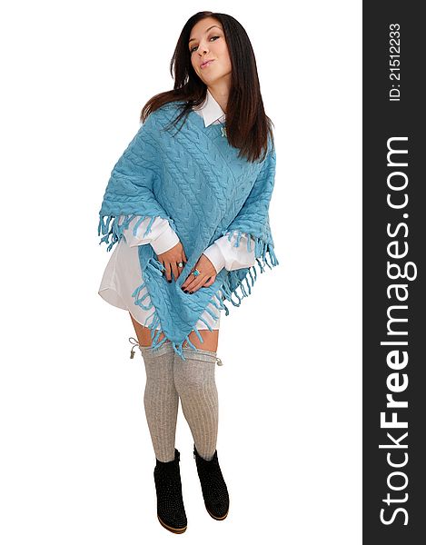 Nice girl in blue poncho poses for the camera. isolated over white