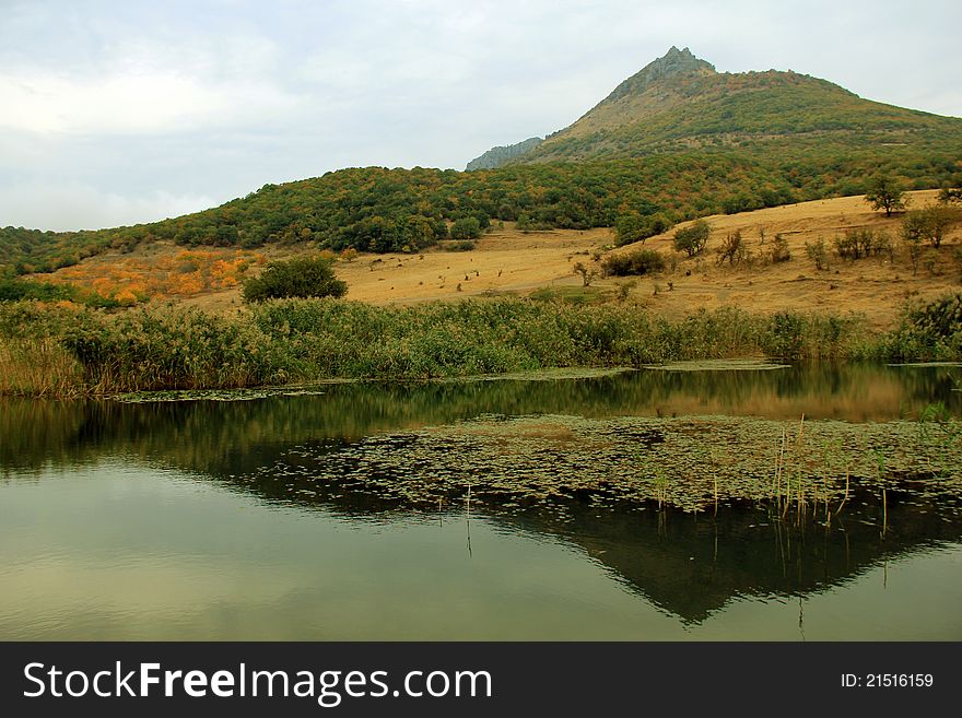 Mountain lake near Demerdj in autumn