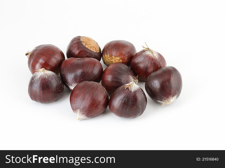 Ten chestnuts on white background