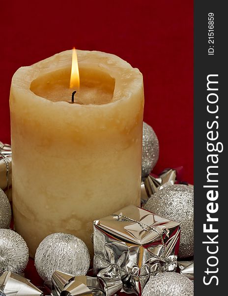 Christmas candle with silver decorations