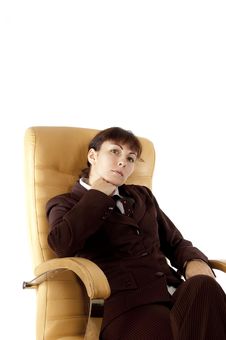 The Business Lady Sits In An Armchair Stock Photo The Business Lady Sits In An Armchair Stock Photo