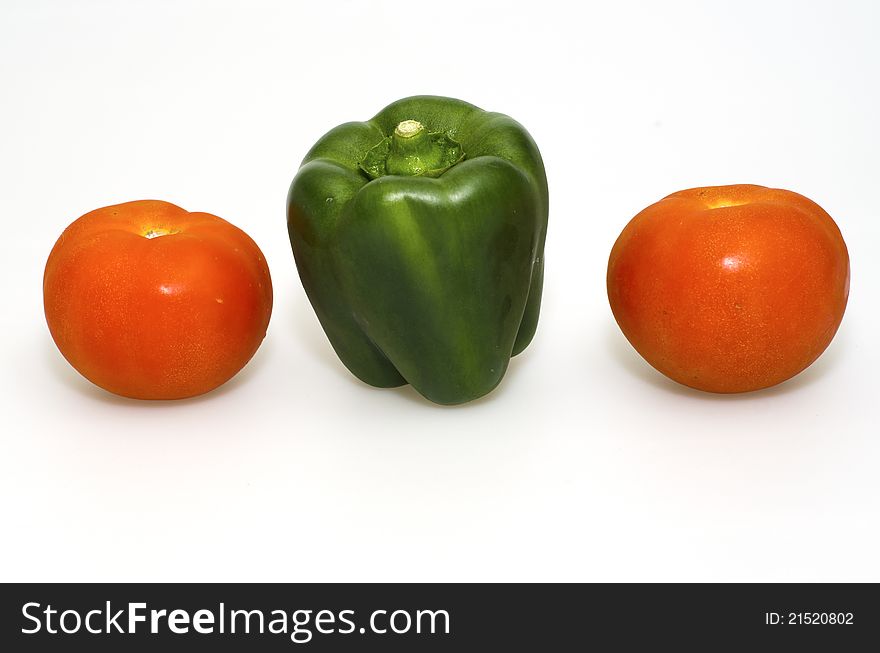 Two tomato and green pepper. Two tomato and green pepper