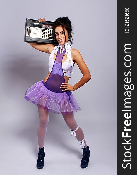 Portrait of freaky woman with a old fashioned tape recorder. Portrait of freaky woman with a old fashioned tape recorder