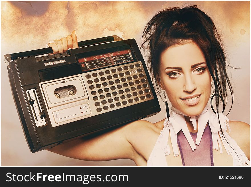 Portrait of freaky woman with a old fashioned tape recorder. Portrait of freaky woman with a old fashioned tape recorder