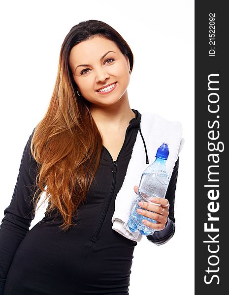 Beautiful smiling woman with bottle of water