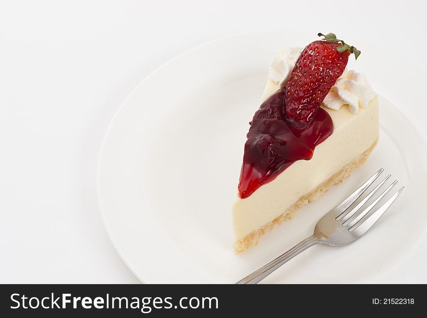 Strawberry Cheesecake on plate and white background