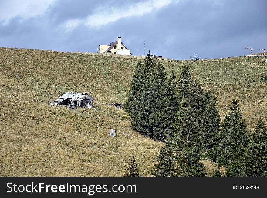 Two cottage near pine forest on mountain top
