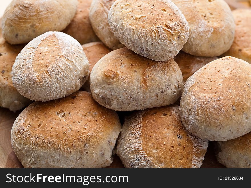 Baked fresh buns in a pile.