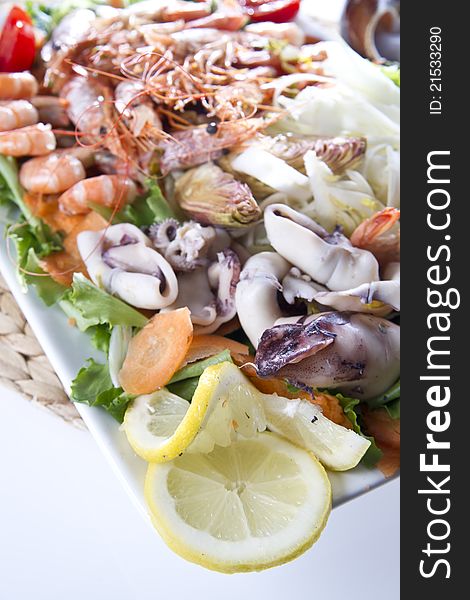 Second dish of Mediterranean cuisine, shrimp and vegetables. Second dish of Mediterranean cuisine, shrimp and vegetables.