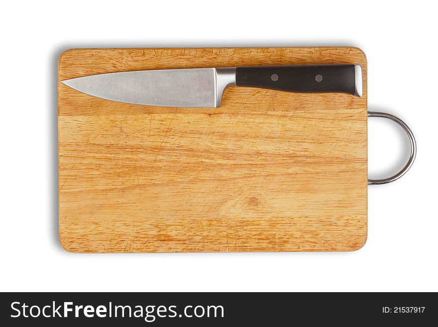 Wooden hardboard with kitchen knife isolated. clipping path included. Wooden hardboard with kitchen knife isolated. clipping path included.