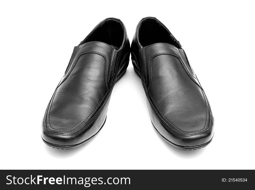 Pair of black man's shoes on white background. Pair of black man's shoes on white background
