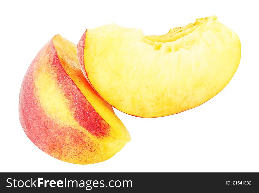 Nectarine fruit segments isolated on white background