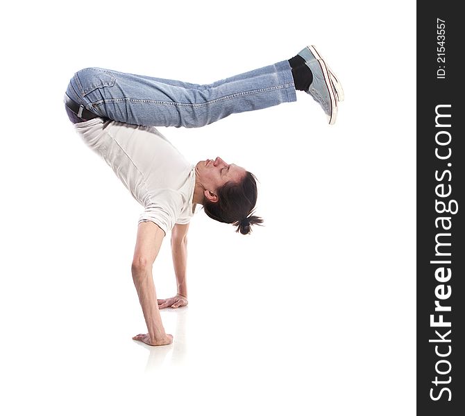 Hip-hop style dancer posing over white background. Hip-hop style dancer posing over white background