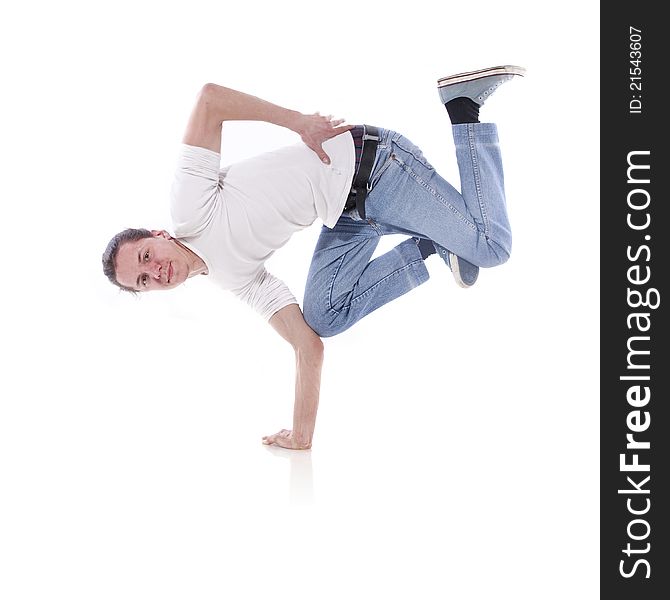 Hip-hop style dancer posing over white background. Hip-hop style dancer posing over white background