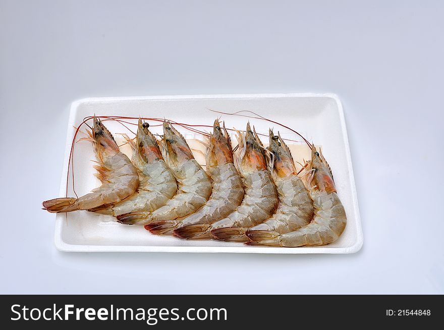 Fresh shrimps on white package. Fresh shrimps on white package