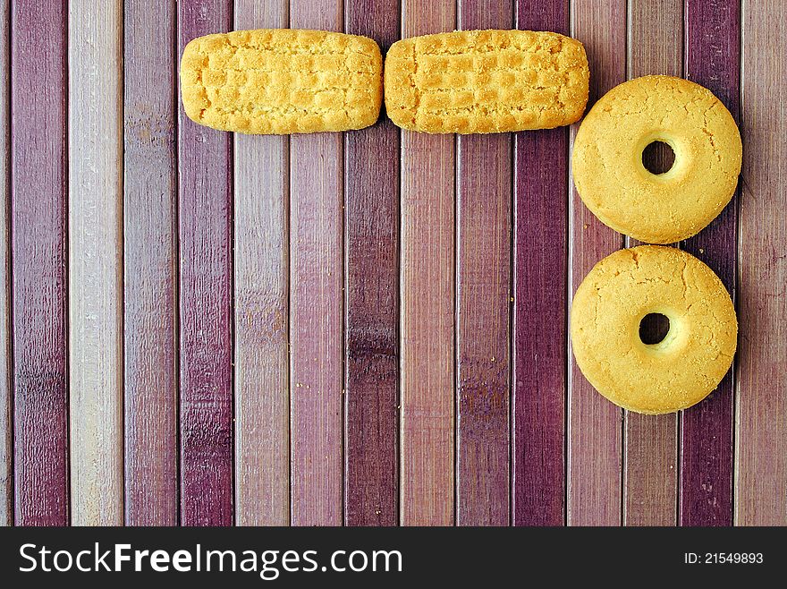 Biscuits on purple bamboo place mat, breakfast or tea time