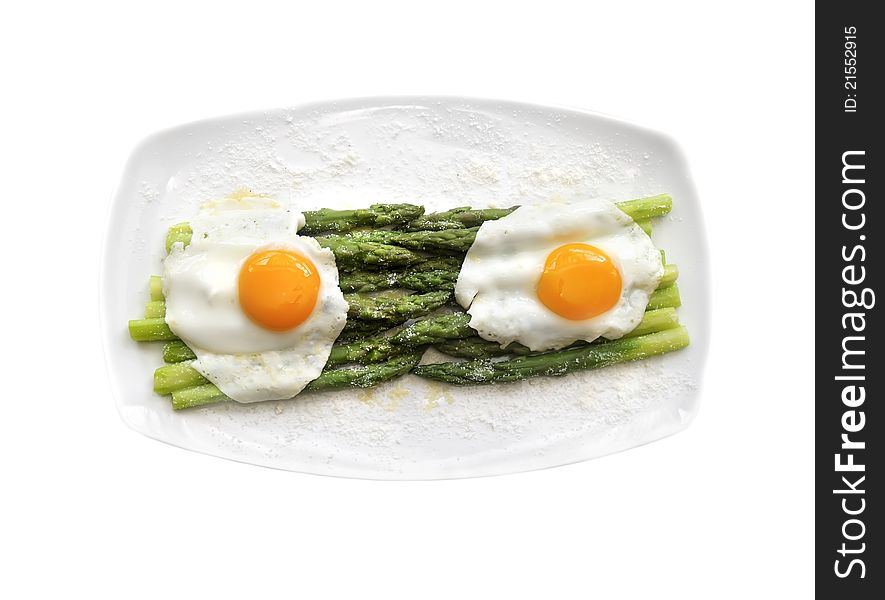Fried eggs with asparagus isolated