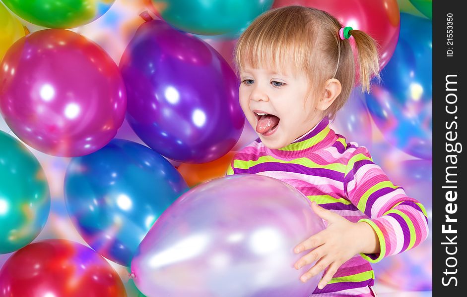 Foto-little girl holding balloons. Foto-little girl holding balloons