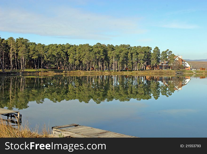 A pacific lake with good reflections near the forest. A pacific lake with good reflections near the forest.