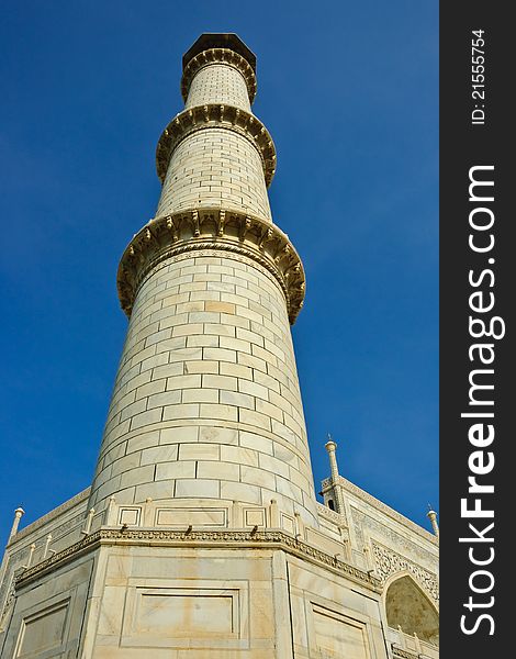 One of Minaret in Taj Mahal in Agra in the Uttar Pradesh region of India. It is a one of New Seven Wonders of the World. One of Minaret in Taj Mahal in Agra in the Uttar Pradesh region of India. It is a one of New Seven Wonders of the World.