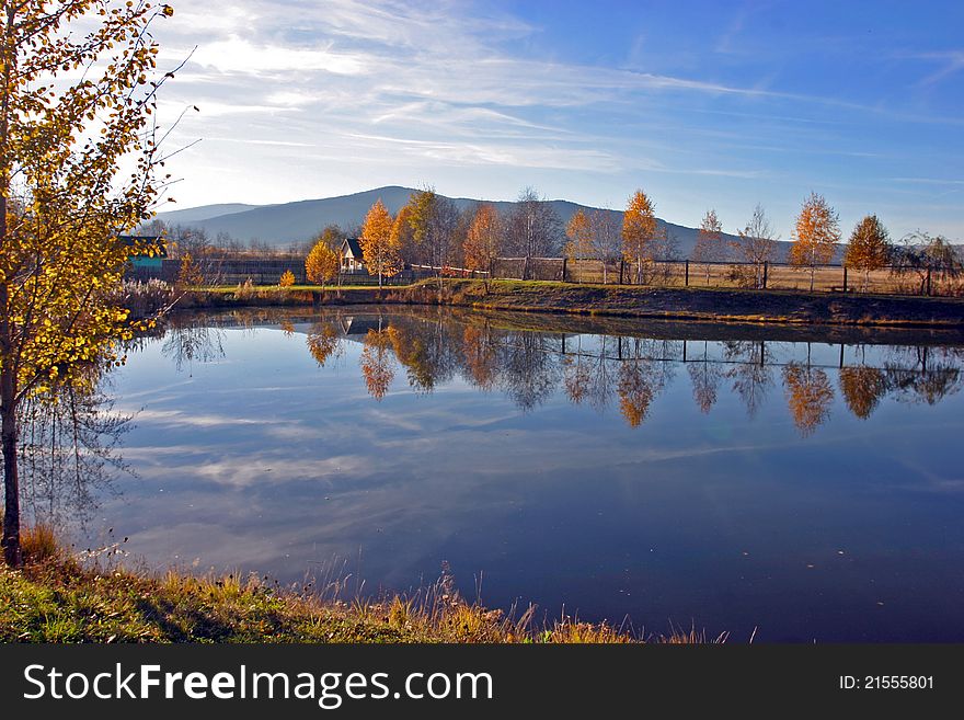 A cold, autumn lake in the mountains. A cold, autumn lake in the mountains