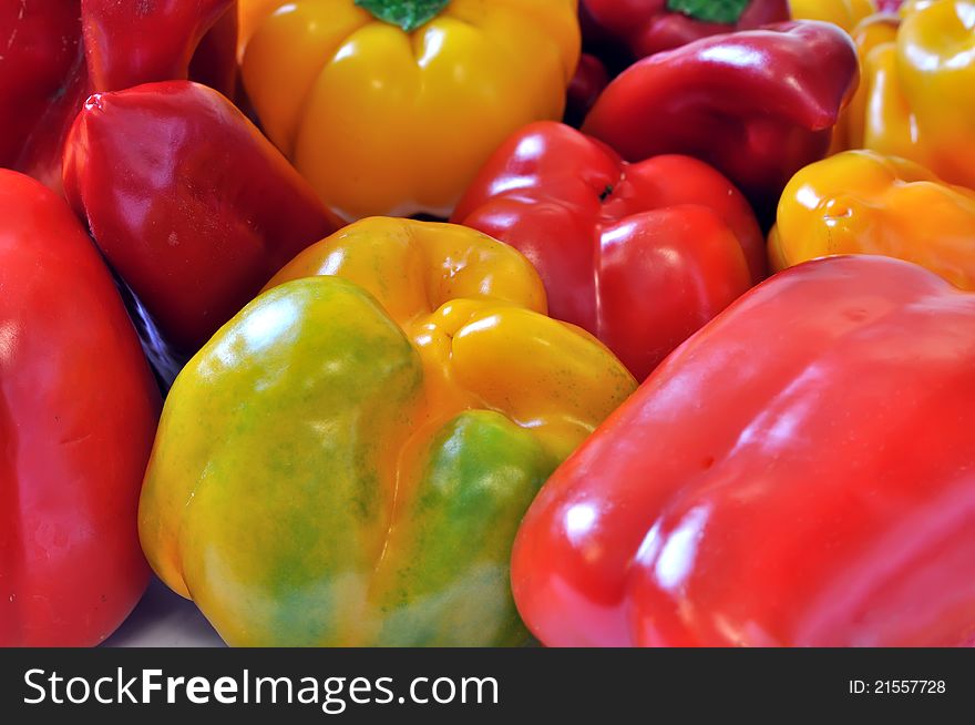 Assorted fresh multicolored peppers in the kitchen. Assorted fresh multicolored peppers in the kitchen