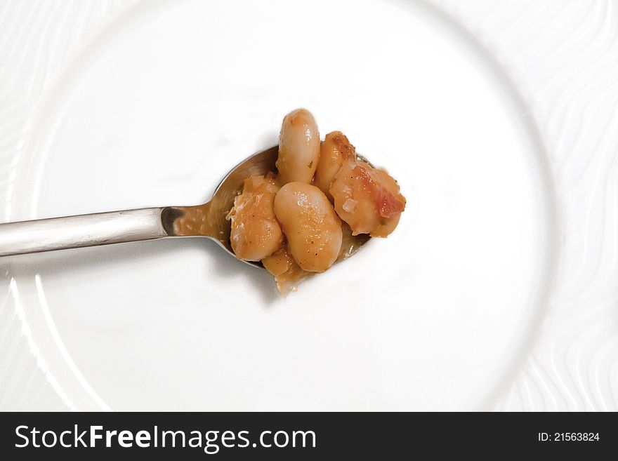 Baked giant beans with tomato, onions and oregano. Baked giant beans with tomato, onions and oregano