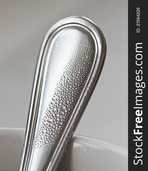 Wet Spoon In Cup