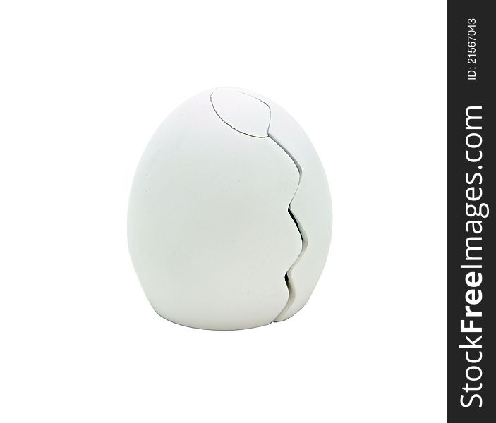 Isolated cracking egg on white for easter holiday celebration